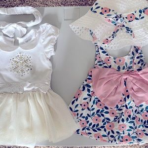 Baby 6 months old dresses with a hat and hair band.